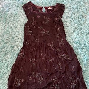 Satin feel black mini dress with feather design